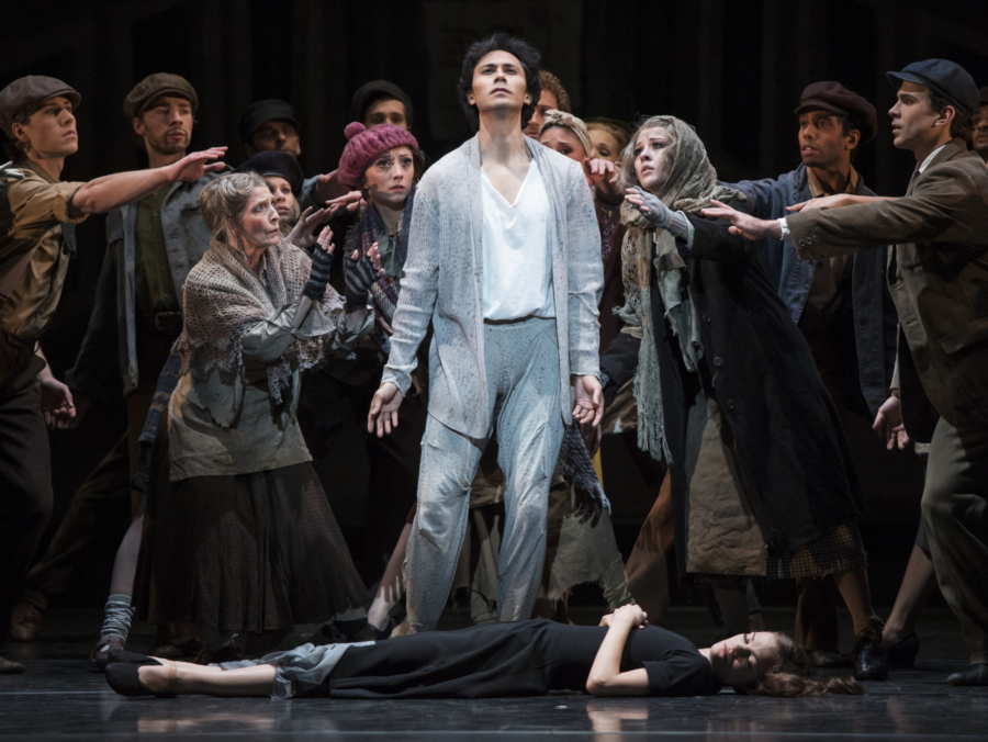 <p><em>Miracle in the Gorbals:</em> César Morales as the Stranger and Delia Mathews as the Suicide with Artists of Birmingham Royal Ballet</p>. Credit: Bill Cooper.