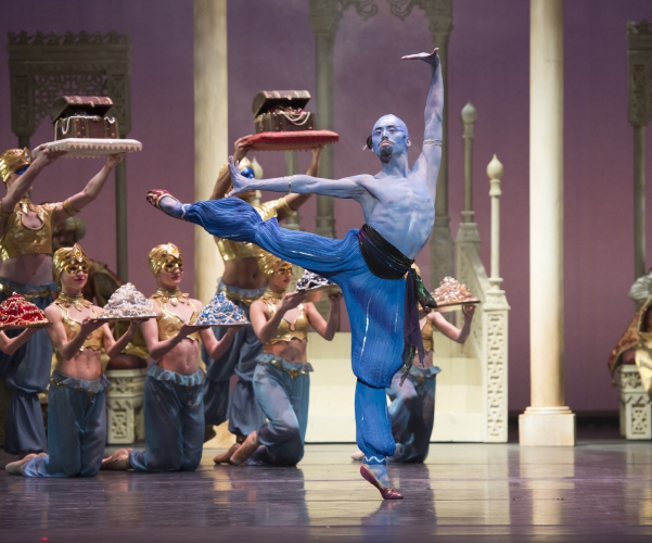 <p><em>Aladdin: </em>Tzu-Chao Chou as the Djinn of the Lamp with Artists of Birmingham Royal Ballet</p>. Credit: Bill Cooper.