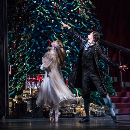 <p><em>The Nutcracker:</em> Karla Doorbar as Clara and Valentin Olovyannikov as Drosselmeyer</p>. Credit: Bill Cooper.