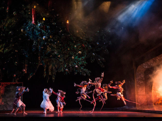 <p><em>The Nutcracker: </em>Karla Doorbar as Clara with Artists of Birmingham Royal Ballet as Rats</p>. Credit: Bill Cooper.
