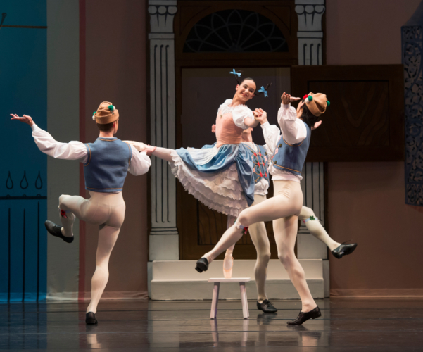 <p><em>Façade:</em> Arancha Baselga as the Milkmaid with Artists of Birmingham Royal Ballet in 'Yodelling'</p>. Credit: Bill Cooper.