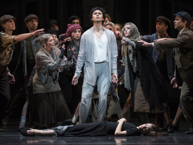 <p><em>Miracle in the Gorbals:</em> César Morales as the Stranger and Delia Mathews as the Suicide with Artists of Birmingham Royal Ballet</p>. Credit: Bill Cooper.