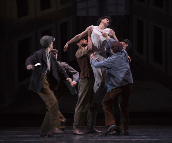 <p><em>Miracle in the Gorbals:</em> César Morales as the Stranger with Artists of Birmingham Royal Ballet</p>. Credit: Bill Cooper.