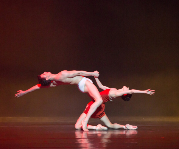<p><em>Carmina burana: </em>Samara Downs as Fortuna and Iain Mackay as Third Seminarian</p>. Credit: Bill Cooper.