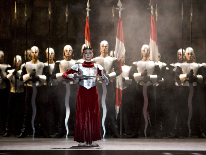 <p><em>Edward II: </em>Elisha Willis as Queen Isabella with Artists of Birmingham Royal Ballet</p>. Credit: Bill Cooper.