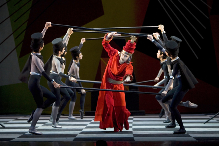 <p><em>Checkmate: </em>Jonathan Payn as the Red King with Artists of Birmingham Royal Ballet</p>. Credit: Bill Cooper.