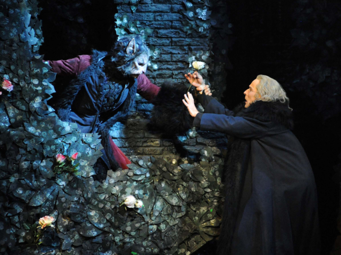<p><em>Beauty and the Beast: </em>Chi Cao as the Beast and Michael O'Hare as the Merchant</p>. Credit: Roy Smiljanic.