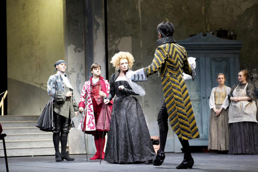<p><em>Cinderella </em>Act I stage rehearsal: Marion Tait as the Stepmother, Robert Gravenor as the Wig Maker, Alexander Campbell as the Dancing Master and Jonathan Caguioa as the Dressmaker</p>. Credit: Andrew Ross.