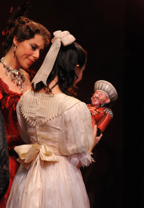 <p><em>The Nutcracker</em> from the wings: Laƫtitia Lo Sardo as Clara and Victoria Marr as Mrs Stahlbaum</p>. Credit: Roy Smiljanic.